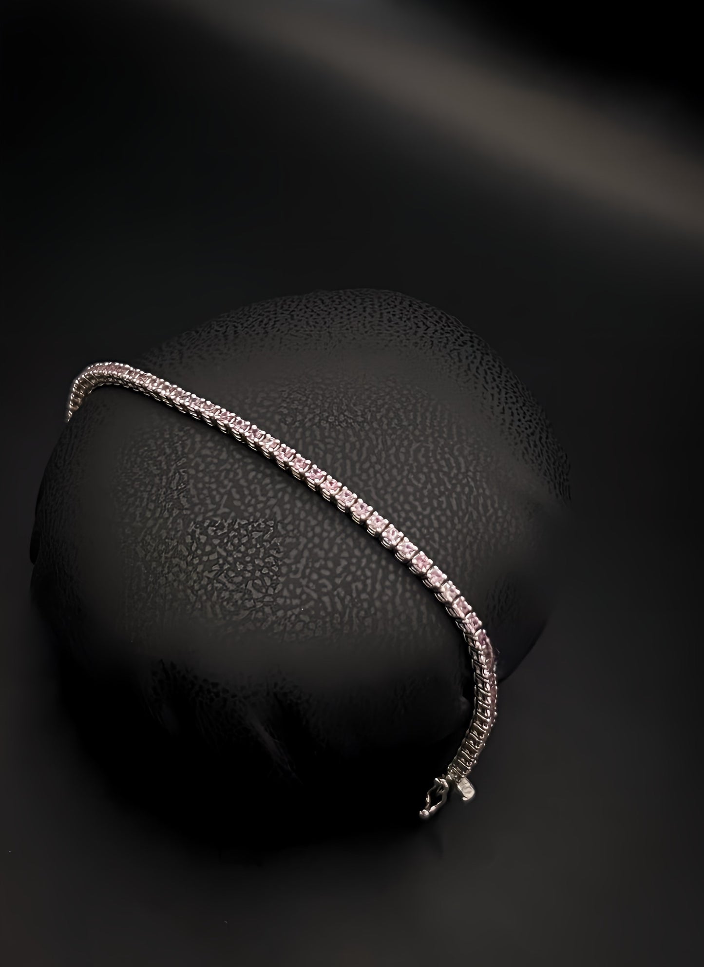 Tennis white gold bracelet with pink natural sapphires