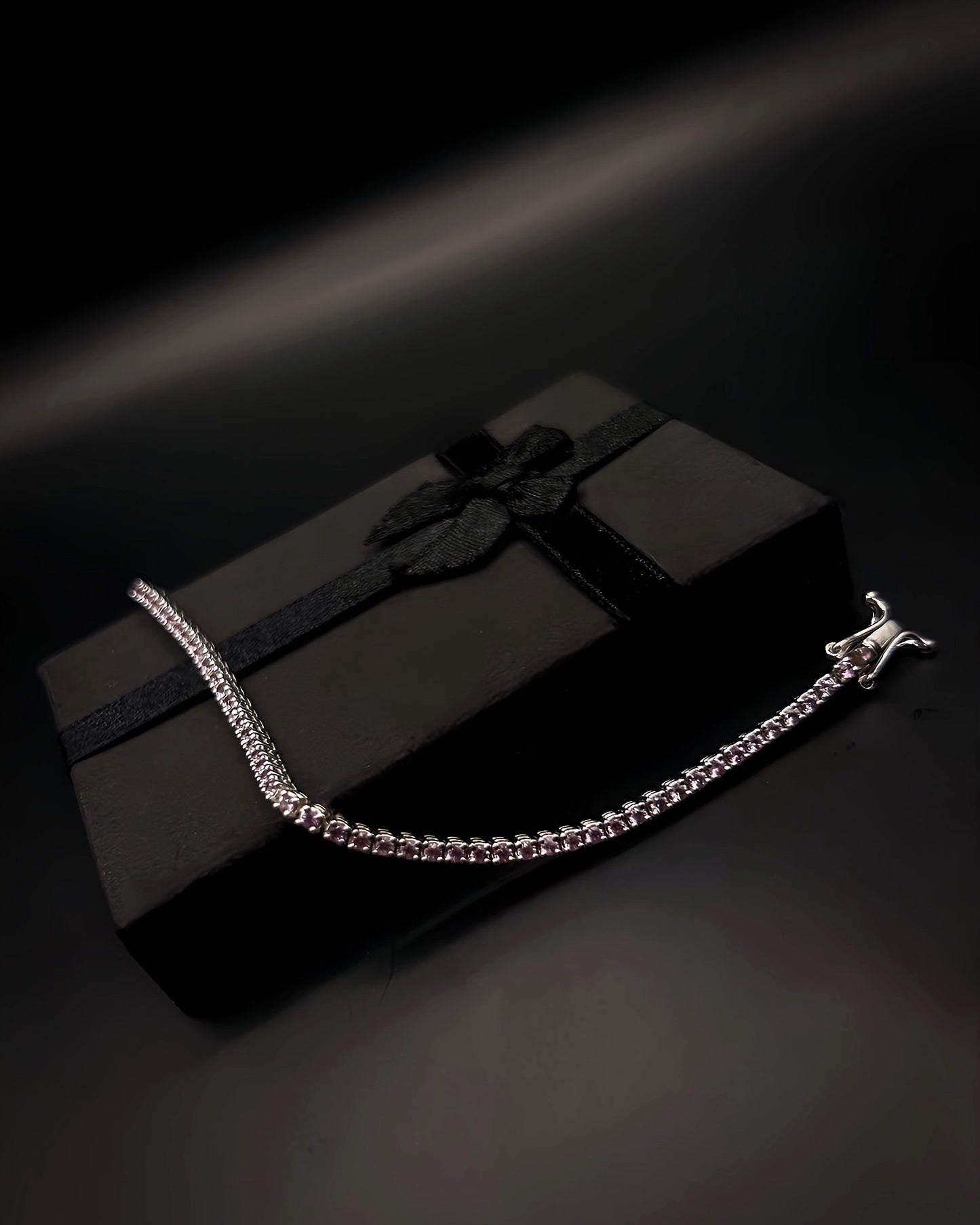 Tennis white gold bracelet with pink natural sapphires