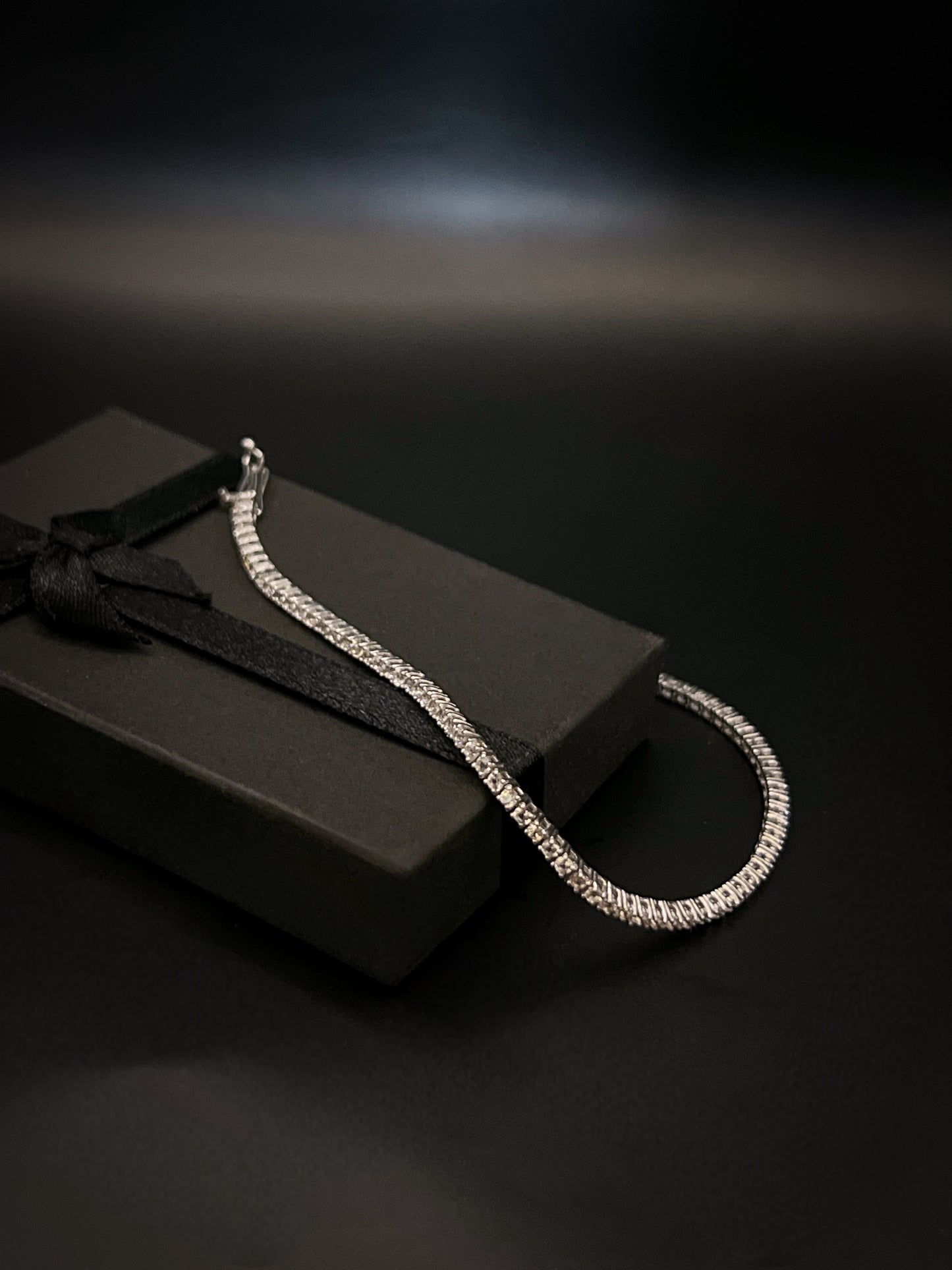 Tennis white gold bracelet with natural white sapphires