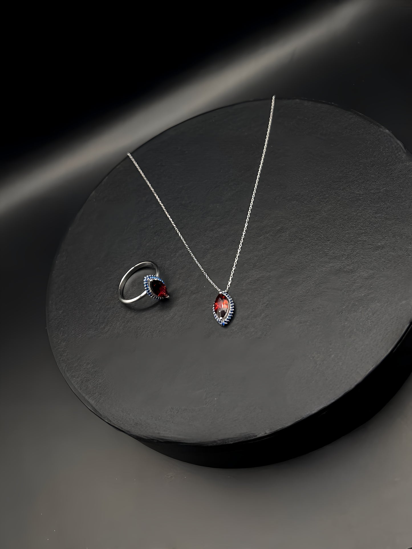 White Gold Pendant and Ring Set with Garnet and Blue Sapphire