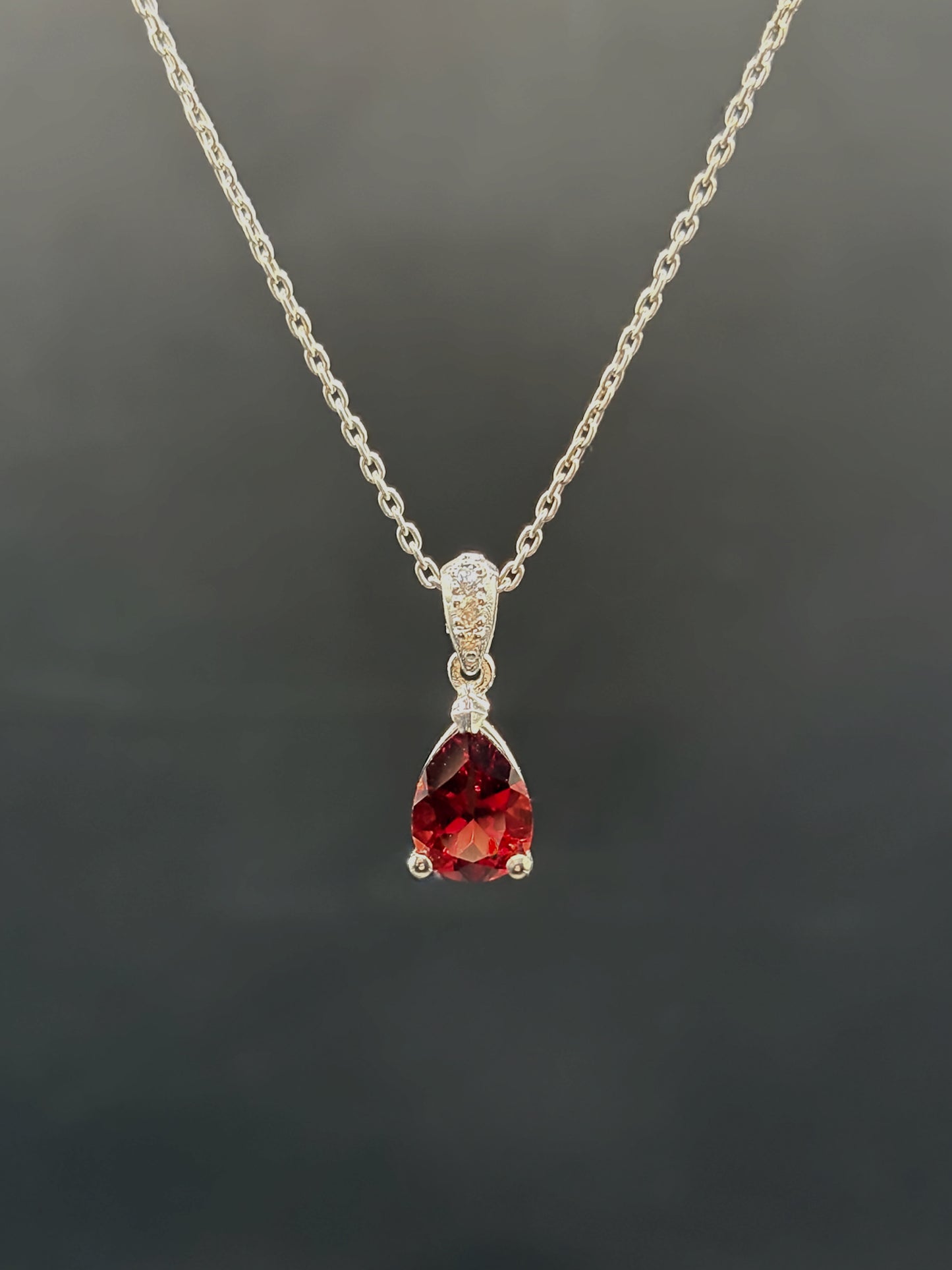 White Gold Set Featuring Red Pear Shaped Garnets & White Sapphire Entourage