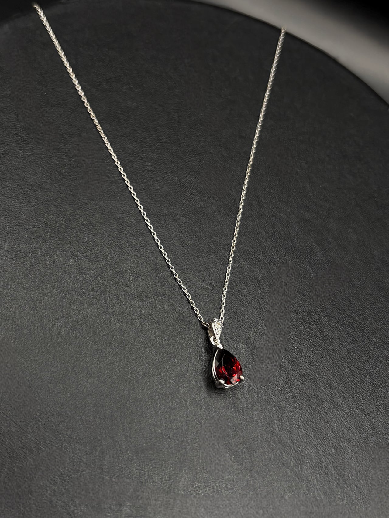 White Gold Set Featuring Red Pear Shaped Garnets & White Sapphire Entourage
