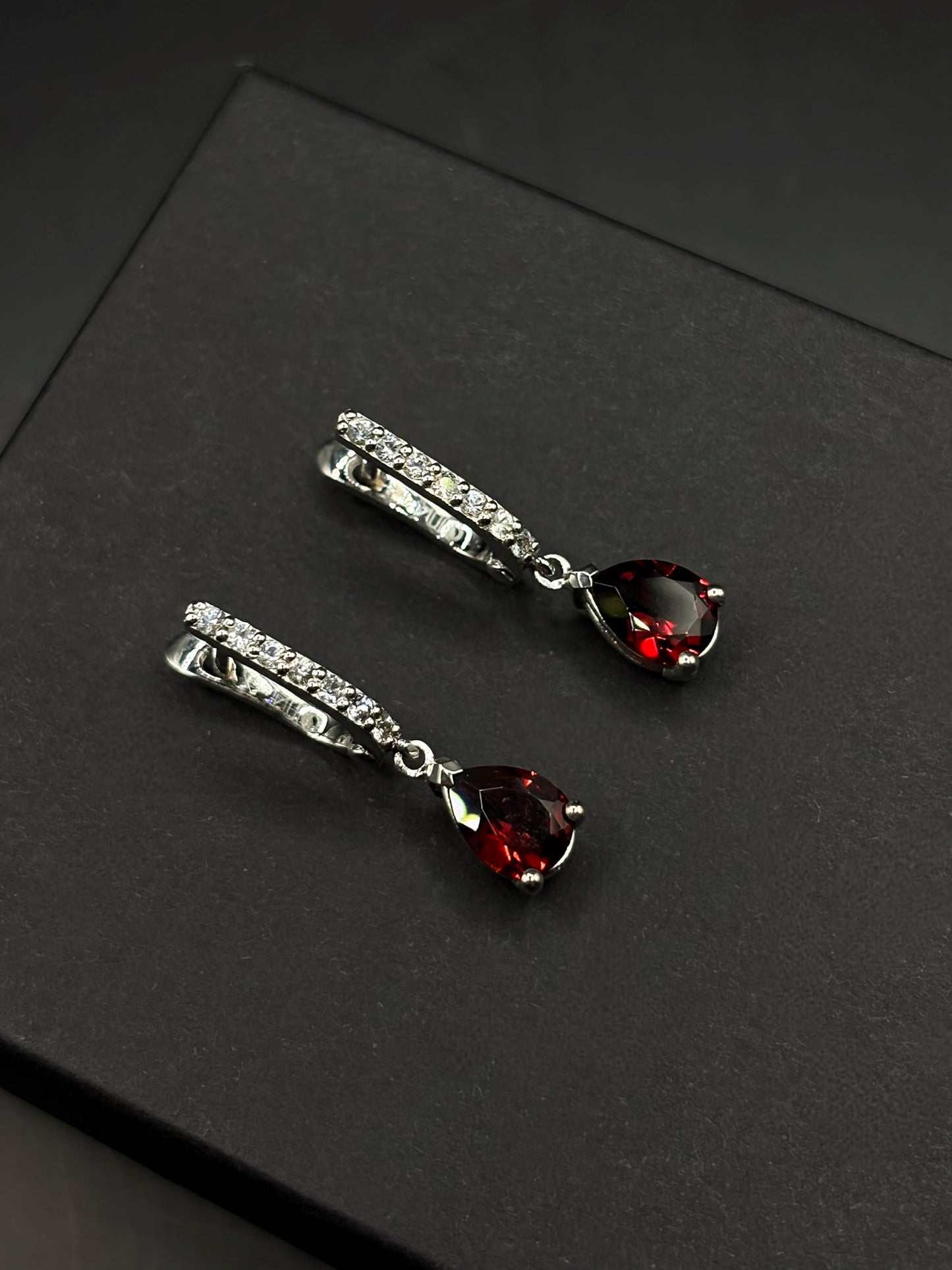 White Gold Set Featuring Red Pear Shaped Garnets & White Sapphire Entourage